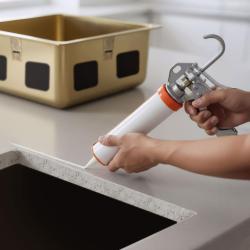 Syrfri Silikonlim för montering av undermonterade rostfria diskhoar